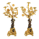 A Pair of 19th Century French Gilt Bronze Figural Candelabra In The Manner Of Clodion