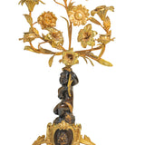 A Pair of 19th Century French Gilt Bronze Figural Candelabra In The Manner Of Clodion