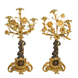 A Pair of 19th Century French Gilt Bronze Figural Candelabra In The Manner Of Clodion