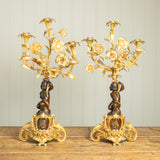 A Pair of 19th Century French Gilt Bronze Figural Candelabra In The Manner Of Clodion