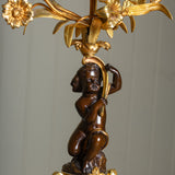 A Pair of 19th Century French Gilt Bronze Figural Candelabra In The Manner Of Clodion