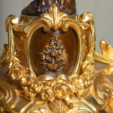 A Pair of 19th Century French Gilt Bronze Figural Candelabra In The Manner Of Clodion