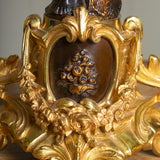 A Pair of 19th Century French Gilt Bronze Figural Candelabra In The Manner Of Clodion