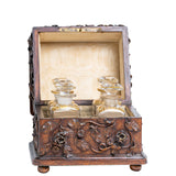 A 19th Century French Black Forest Rose Carved Box With Scent Bottles